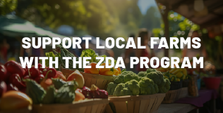 Fresh vegetables displayed at an outdoor farmers market with the overlaid text: 'Support the local farming community with the ZDA Program